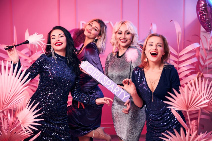 glamorous contented women smart dresses looking ahead